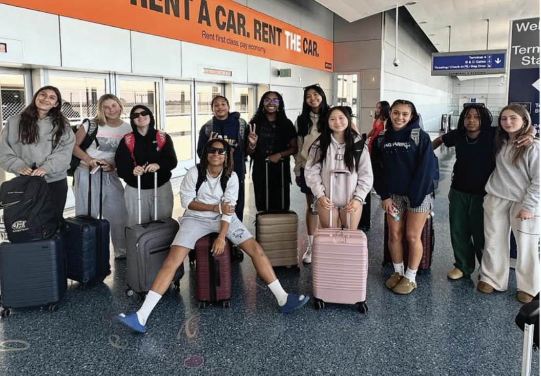 Out of state, out of mind: The varsity girls' basketball team embarks on their journey to Arizona for a basketball tournament, eager to hop on the plane.