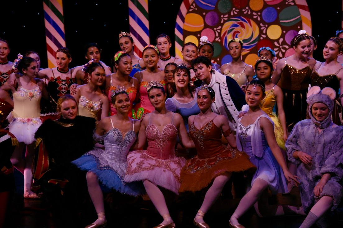 Cast members pose after their student Nutcracker production.